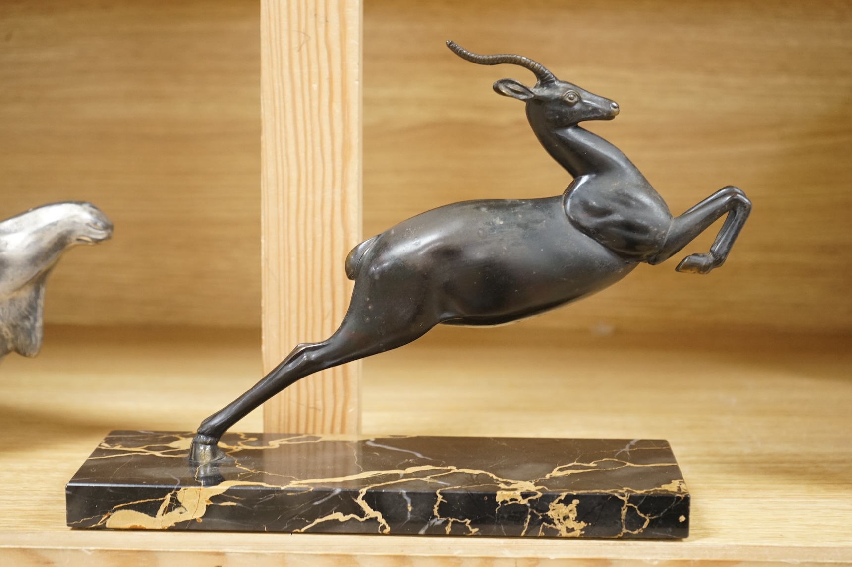 A Kayserzinn Versilbert ‘moose’ centrepiece with presentation inscription dated 1907, 47cm wide